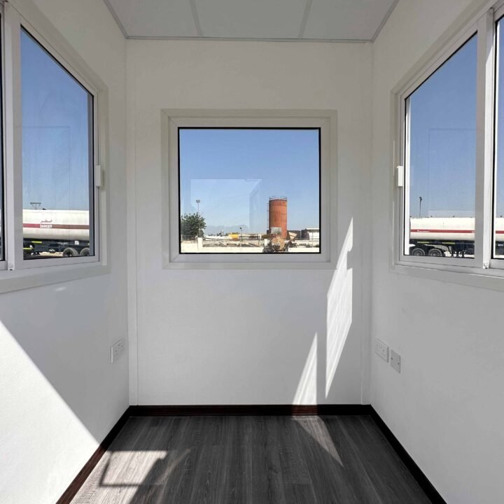 Black and white portable security cabins uae